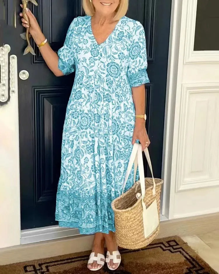 Robe fleurie Astrid® avec un élégant col en V