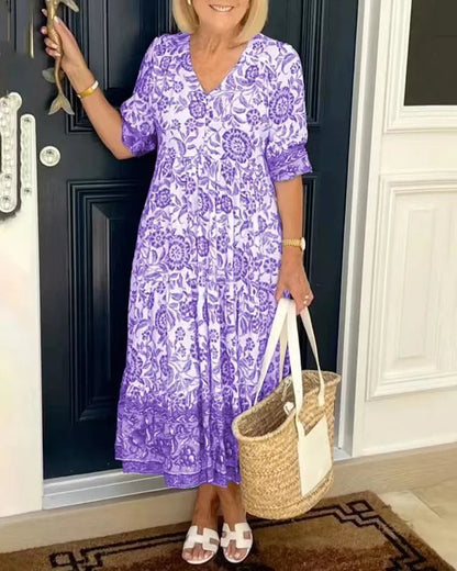Robe fleurie Astrid® avec un élégant col en V