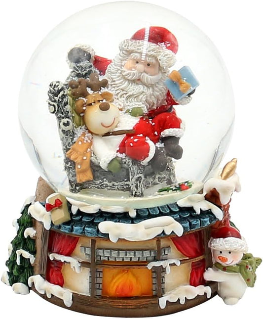 Boule à Neige - Renne dans Fauteuil - Père Noël sur Cheminée