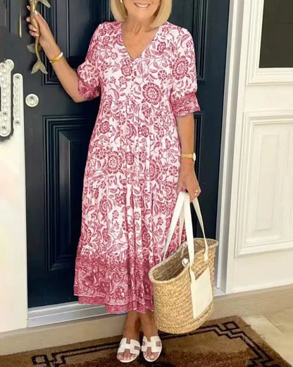 Robe fleurie Astrid® avec un élégant col en V