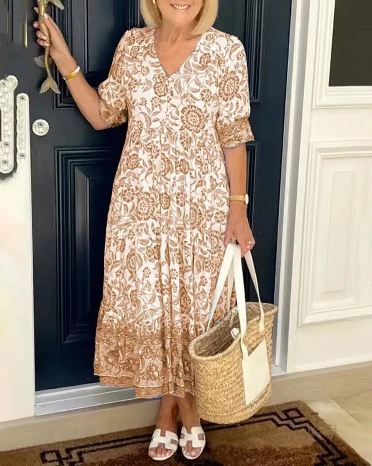 Robe fleurie Astrid® avec un élégant col en V